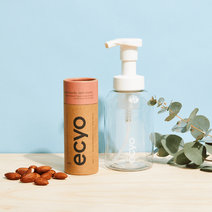 Cylinder of soap refills and foaming soap dispenser. Almond and Vanilla, just add water.