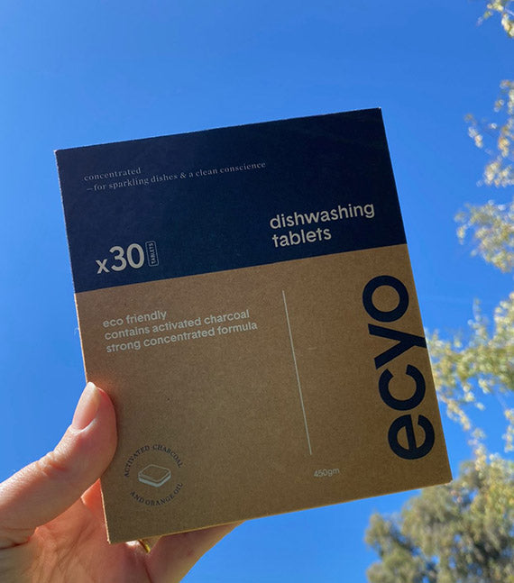 Close-up of Ecyo dishwasher tablets – compact, plastic-free formula for sparkling clean dishes